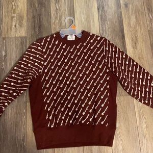 Maroon colored Champion sweatshirt
